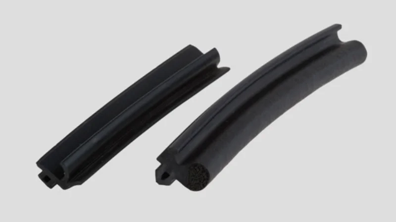 Window gasket sealing glass to frame for weatherproofing noise reduction and thermal movement absorption